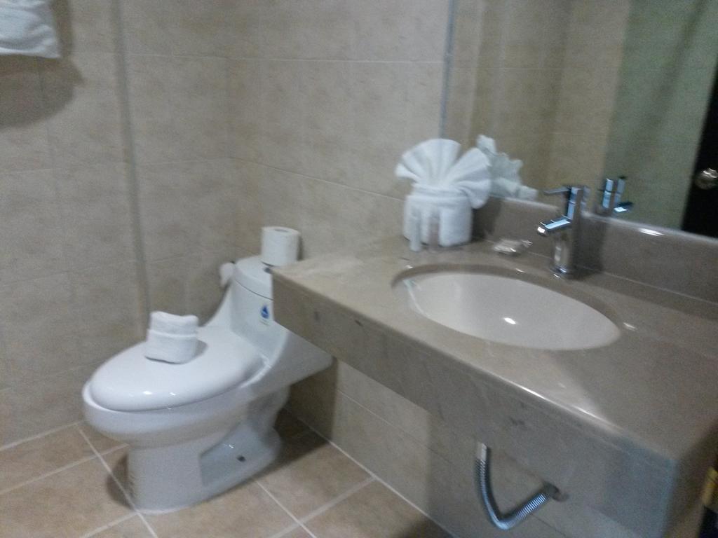 Hotel Osalle Inn Чигнауапан Номер фото